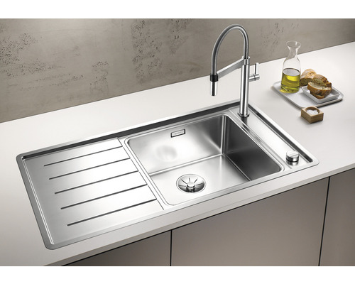 Roestvrijstalen spoelbak met afdruiprek en kraan