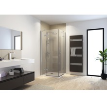 Moderne badkamer met douchecabine, wastafel en handdoekradiator