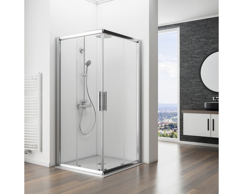 Hoekdouche met douchekraan en handdouche in een modern ingerichte badkamer.