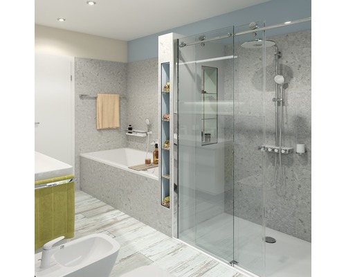 Badkamer met ligbad, douche, bidet en wastafel