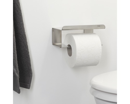 Toiletpapierhouder van roestvrij staal met rol papier en Tiger logo.