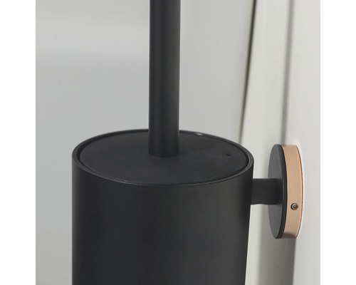 Detailopname van een toiletborstel voor wandmontage
