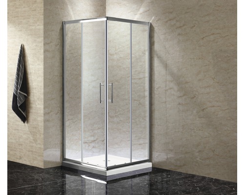 Hoekdouche met heldere glazen deuren en zilverkleurige frames in de badkamer