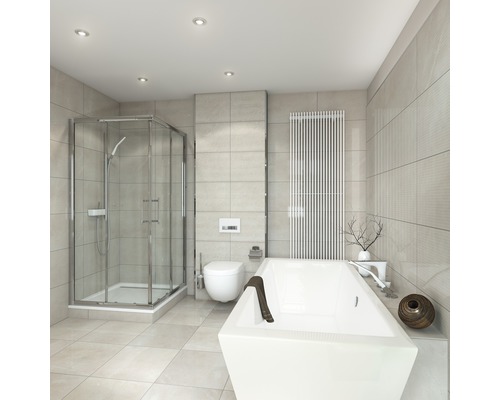 Moderne badkamer met douche, bad, toilet en radiator