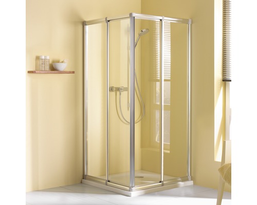 Hoekdouche met glazen deuren en armatuur in badkamer