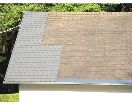 Dak met oude en nieuwe dakpannen