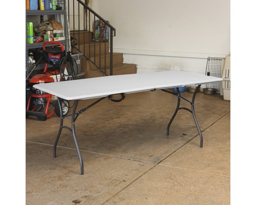 Lange, inklapbare tafel met stalen poten voor gebruik binnenshuis