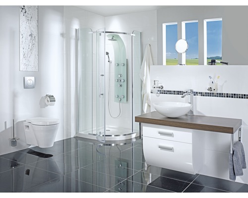 Badkamer met douche, wastafel, onderkast en toilet.