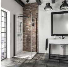 Moderne badkamer met douchecabine, wastafel en spiegel in een stijlvolle omgeving.