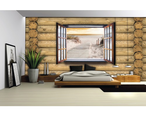 Slaapkamer met fotobehang in houtlook en uitzicht op het strand door het raam