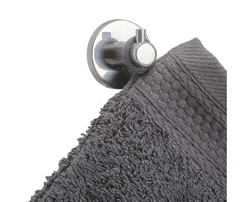 Roestvrijstalen handdoekhouder met grijze handdoek