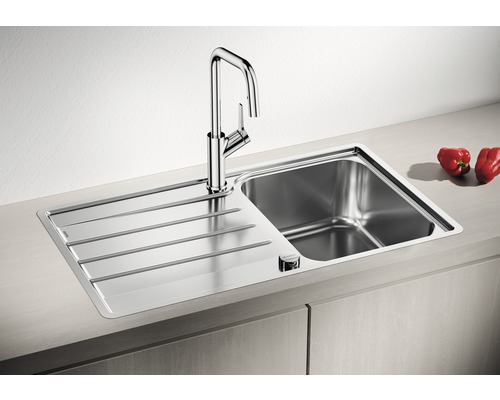 Roestvrijstalen spoelbak met afdruiprek en kraan