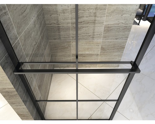 Gedetailleerd aanzicht van een douchecabine met een zwart frame