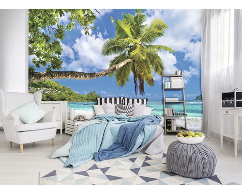 Slaapkamer met fotobehang met palmboommotief