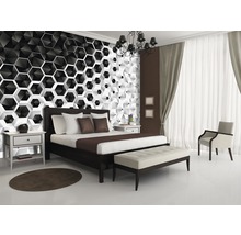Slaapkamer met bed, nachtkastje en modern design wandbekleding
