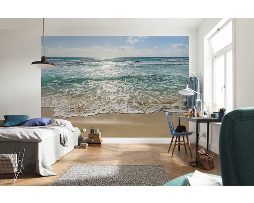 Fotobehang met strandmotief in een slaapkamer