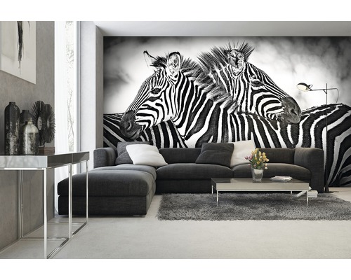 Woonkamer met fotobehang zebra''s, bank en vloerkleed