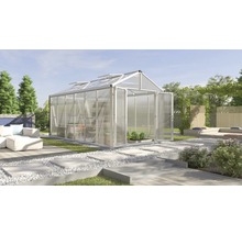 Kas in tuin met open deuren en planten