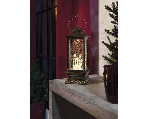 Decoratieve lantaarn met sneeuwpopmotief voor de feestelijke kerstperiode