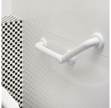 Grijpstang voor de badkamer aan een betegelde muur