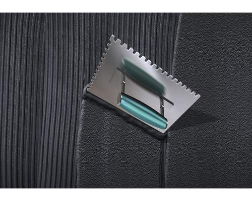 Tandspaan op tegellijm