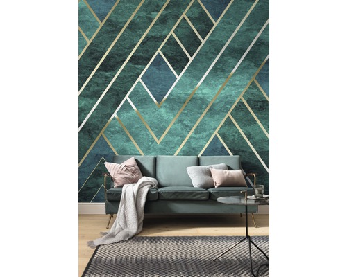 Woonkamer met geometrisch behang in turquoise en goud