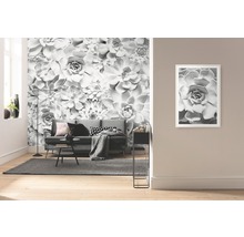 Woonkamer met fotobehang met succulentenmotief en ingelijste afbeelding