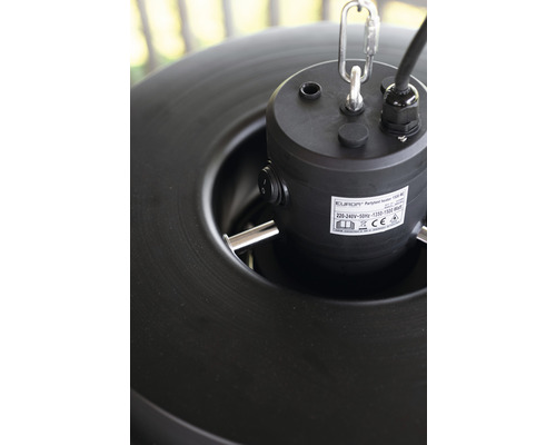 Detailopname van een elektrische kachel met ophanging