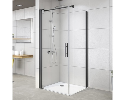 Hoekdouche met zwart frame en douchearmatuur in moderne badkamer