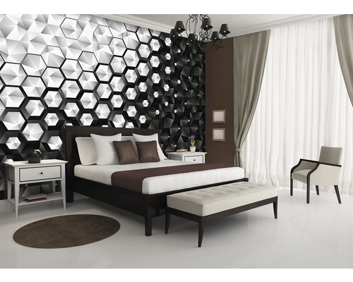 Slaapkamer met geometrisch behang, bed en nachtkastje