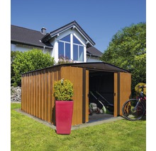 Tuinhuis met grasmaaier en fiets in de tuin