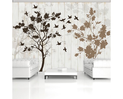 Woonkamer met muursticker met boom- en vogelmotieven