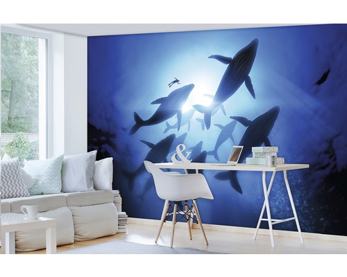 Woonkamer met fotobehang onderwaterwereld, walvissen en duiker