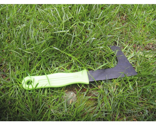 Onkruidsteker met kunststof handvat in het gras