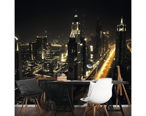 Fotobehang met stadsgezicht bij nacht achter bureau