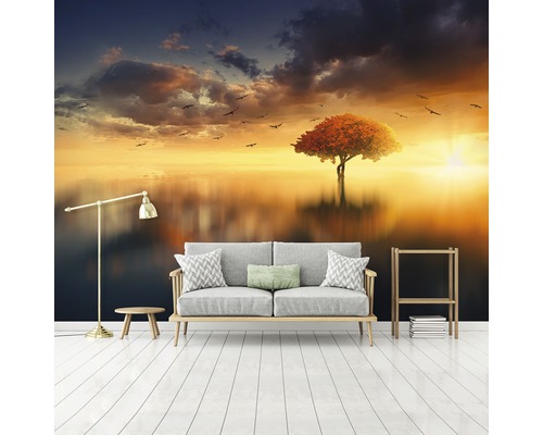 Decoratieve kamer met fotobehang met boom en zonsondergang