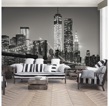 Woonkamer met New York skyline fotobehang, bank en fauteuil