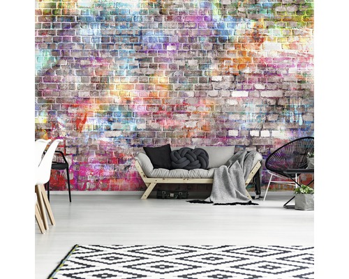 Woonkamer met muur fotobehang, bank en tapijt