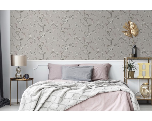 Slaapkamer met vogelboom behang