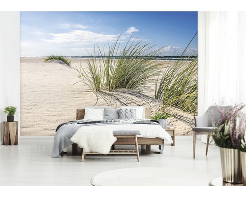 Fotobehang met strandmotief in een slaapkamer