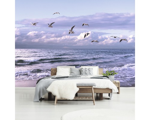 Slaapkamer met fotobehang met strandthema en meeuwen