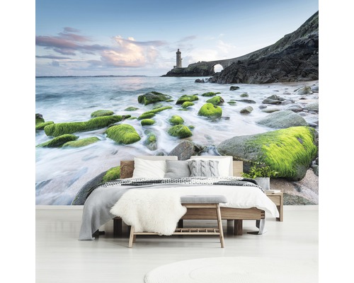 Fotobehang met een vuurtoren aan de kust