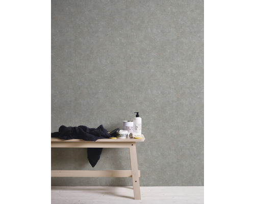 Licht, gestructureerd behang met subtiel patroon op de muur