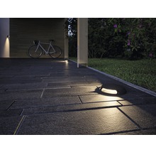 Buitengebied met grondspots en fiets