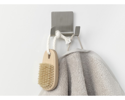 Roestvrijstalen haak met borstel en handdoek