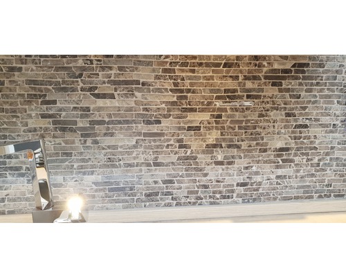 Wanddecoratie met steenpanelen in baksteenlook