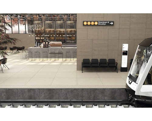 Weergave van een metrostation met zitplaatsen, café en een binnenkomende trein.