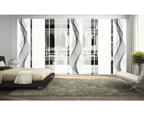 Slaapkamer met grote schuifdeurkast en designelementen