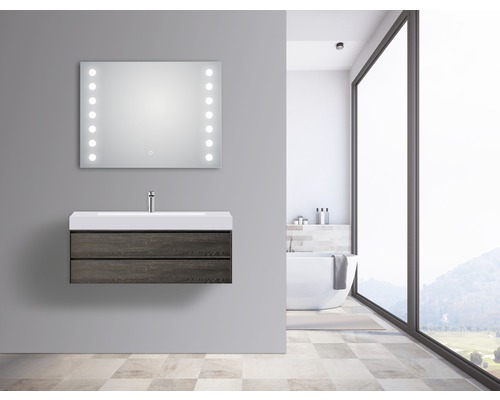 Moderne badkamer met wastafelonderkast, wastafel en verlichte spiegel