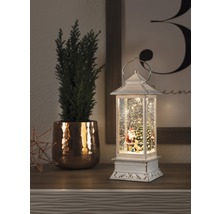Decoratieve sneeuwbollantaarn met kerstman, kerstboom en kunstsneeuw